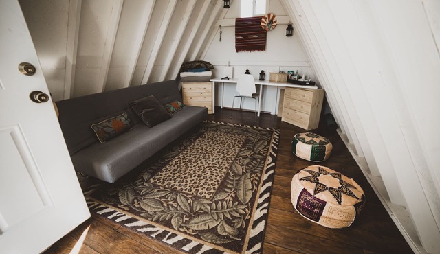 Tiny A-Frame and 6 acres for camping up in the mountains.