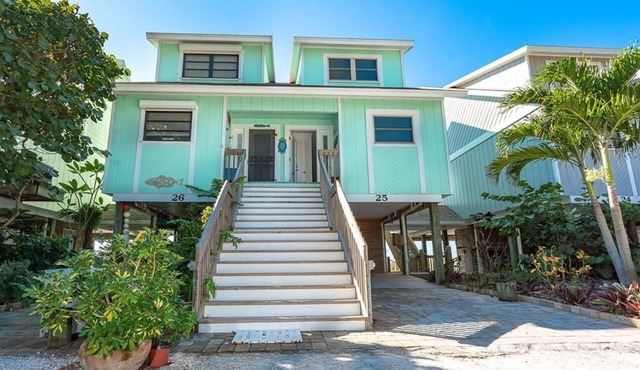Updated Beachfront Villa! Off the porch and onto the sand on secluded island.