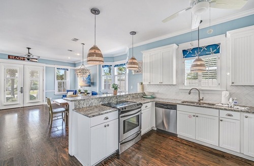 Village of Sugar Beach House | Home with Private Heated Pool 4 Bikes Golf Cart/option, Pet allowed-1 By the Sea